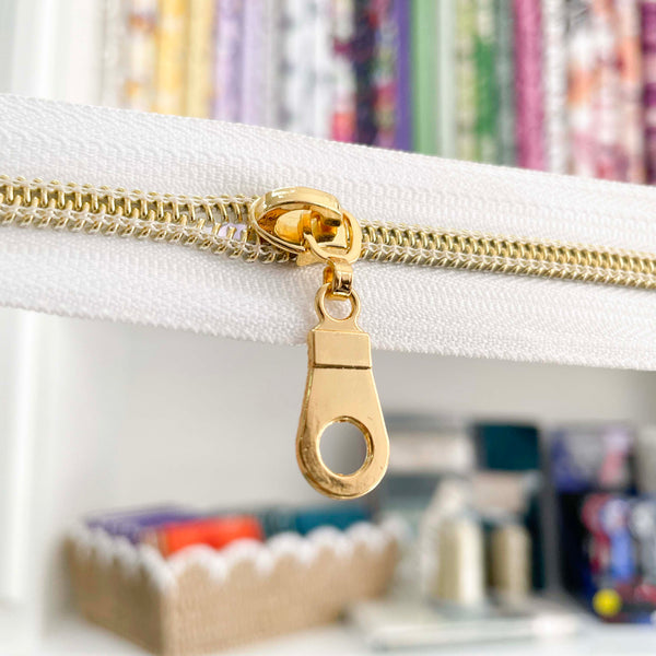 Four Donut Zipper Pulls Gold